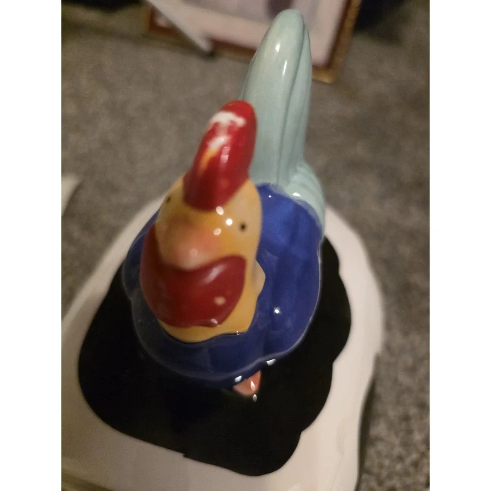 Cow Cookie Jar With Rooster Lid. Small Chip On Lid And Some Red Has Rubbed Off.